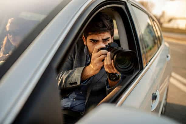Close-up - Young Man Photorapher Sitting In The Car Boynton Beach Private Investigator